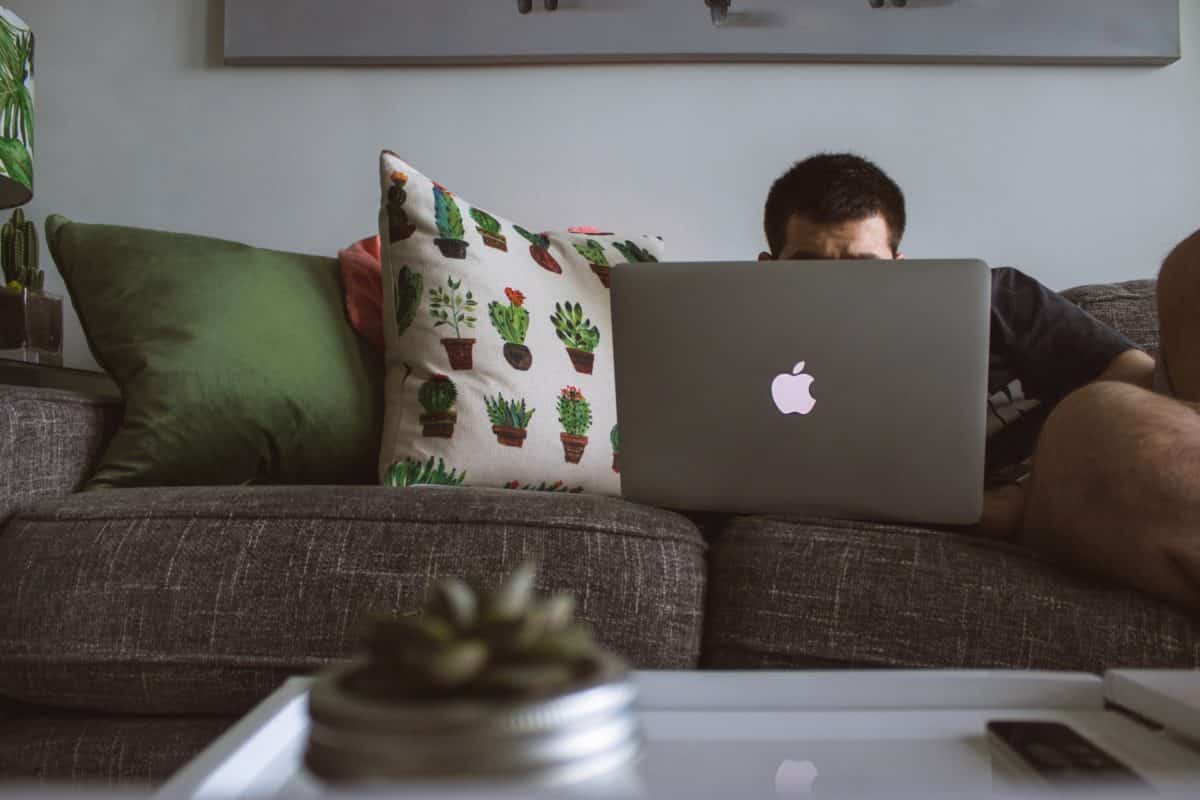 Person watching YouTube on a laptop