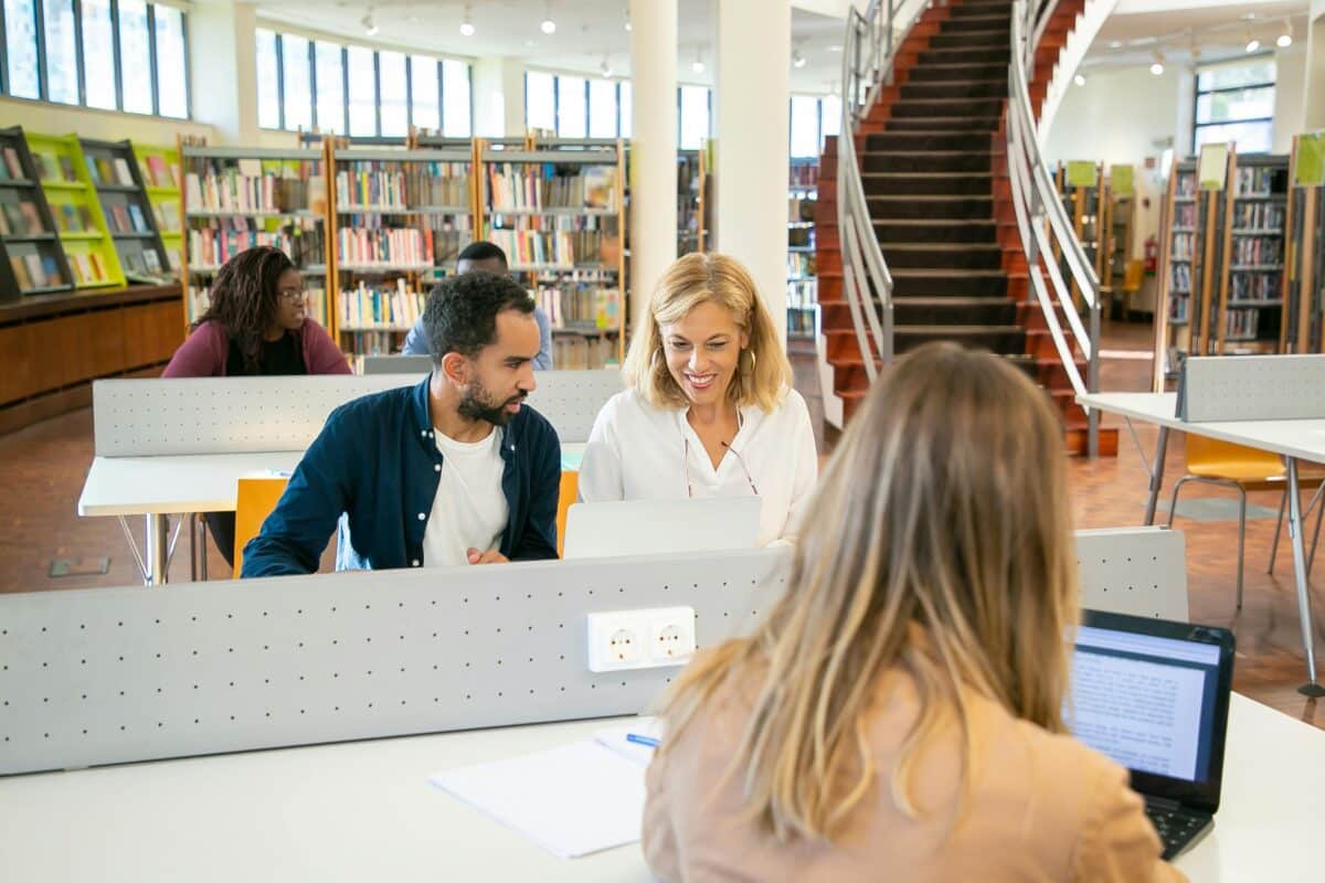 Librarian helping a student